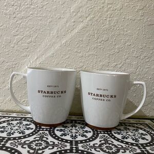 STARBUCKS 2008 Abbey set of 2 white brown print coffee mugs EST 1971 18 oz